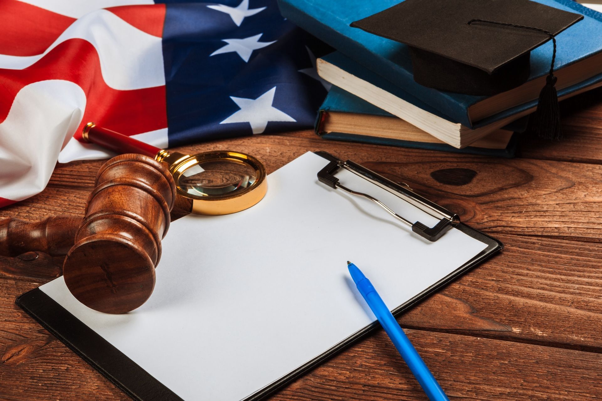 employment law federal changes: U.S. flag and clip board